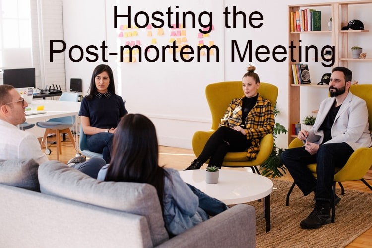 Team is conducting a post-mortem meeting